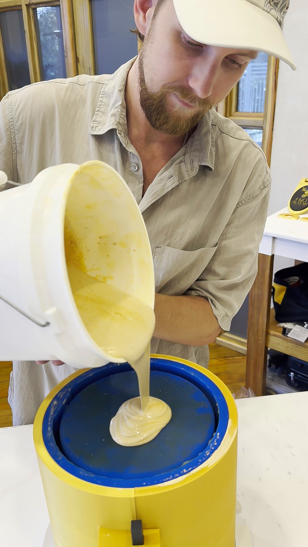 Working hands with clay in warm light
